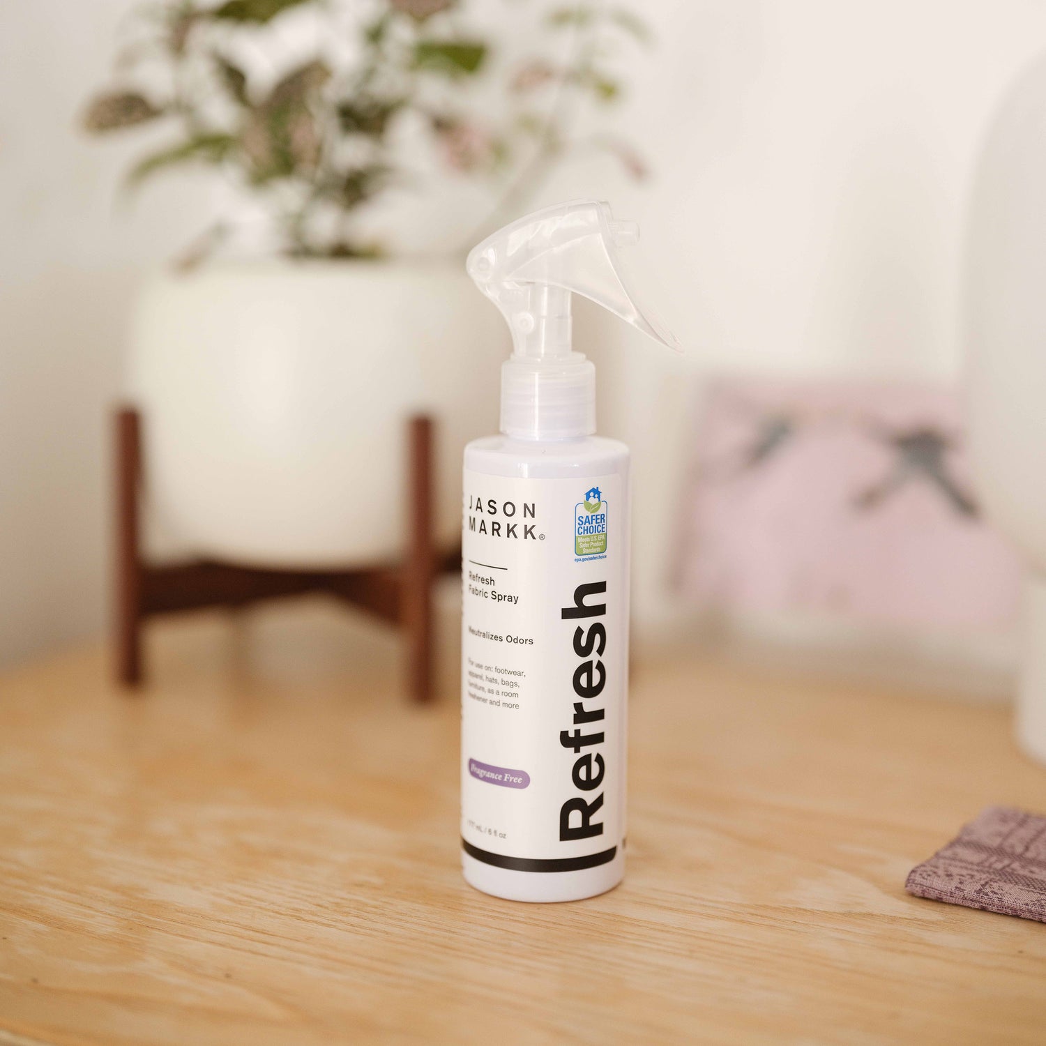 Photo showing the Fragrance Free Refresh Spray on a wooden shelf.