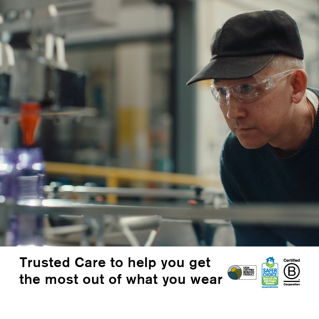 Jason Markk wearing safety glasses in a workshop with text about Trusted Care.