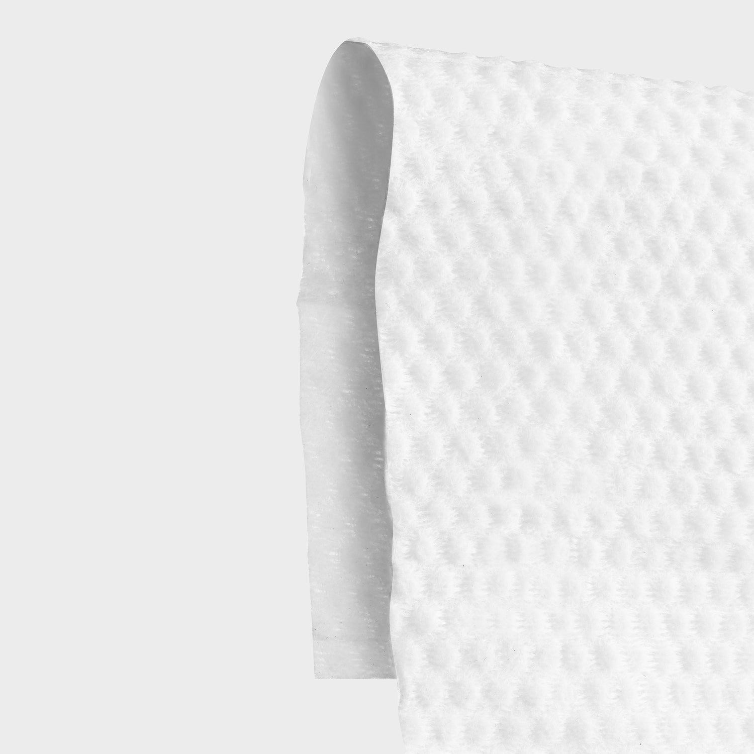 A photo that shows a close-up of the Jason Markk Quick Wipe so you can see the ribbed textured that is great for a better clean.
