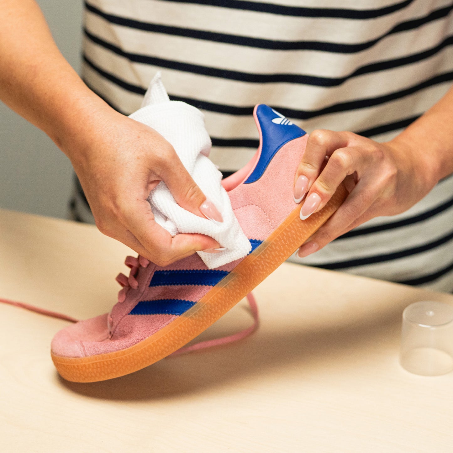 WIPING A PINK ADIDAS GAZELLE WITH A JASON MARKK MICROFIBER TOWEL