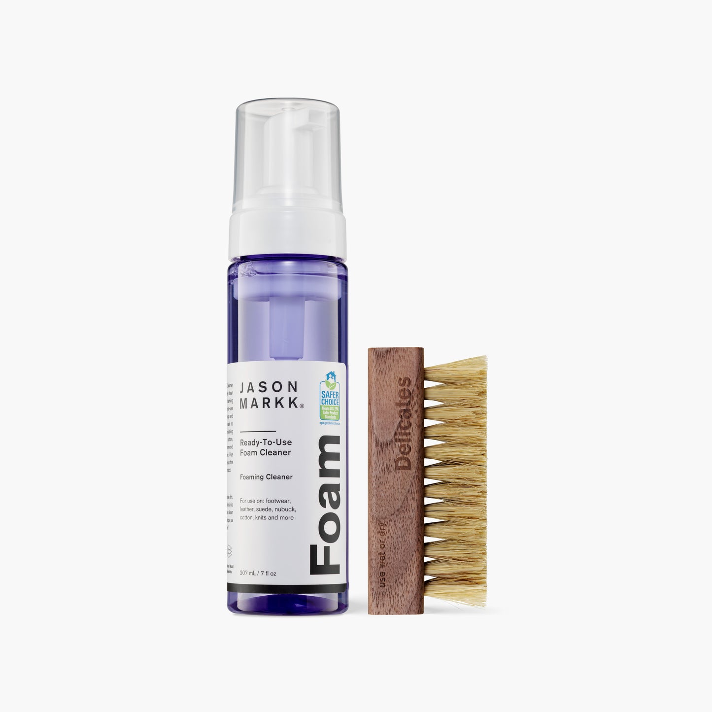 A photo showing the Jason Markk 7oz Ready-To-Use Foam Cleaner and the Delicates Brush out of package.