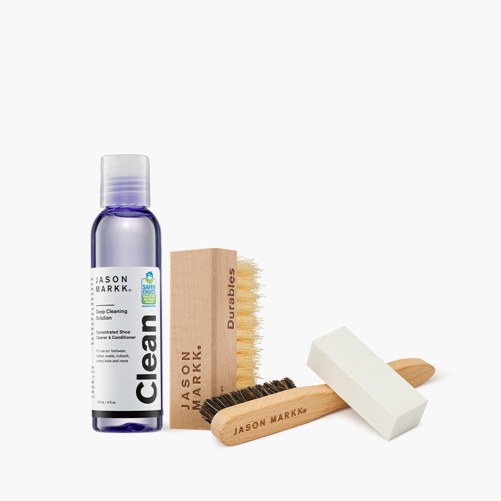 A photo showing the Jason Markk Essential Kit and Premium Suede Cleaning Kit out of package.