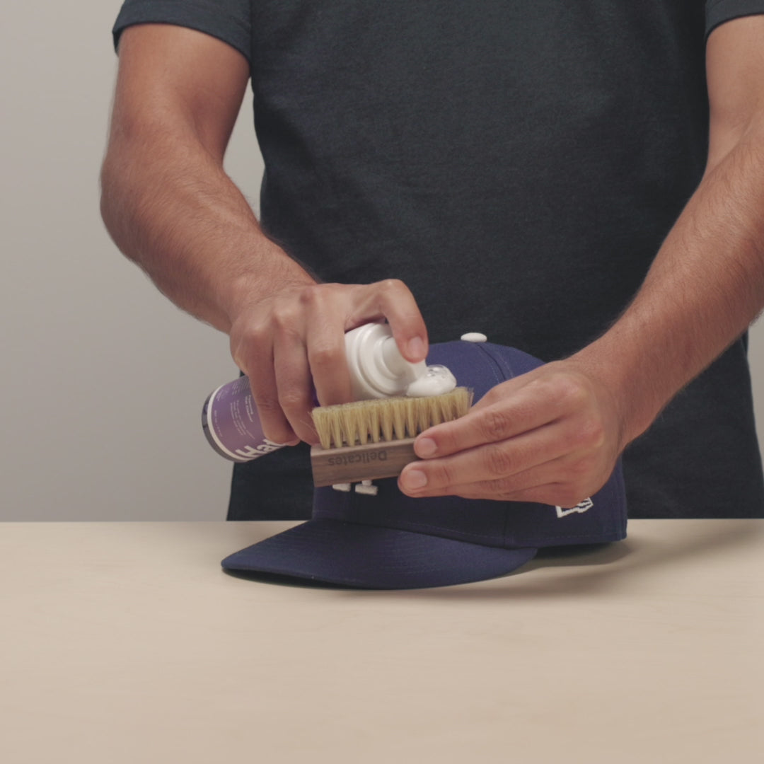 JASON MARKK STEP BY STEP PROCESS APPLYING, SCRUBBING & WIPING NEW ERA DODGER HAT WITH HAT FOAM CLEANER, DELICATES BRUSH AND MICROFIBER TOWEL
