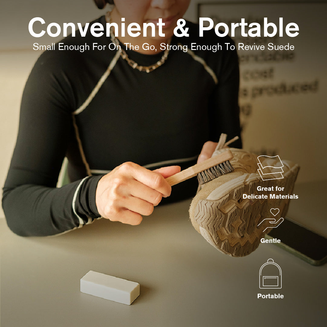 Person using a Jason Markk suede brush to clean a sneaker at a table, with suede eraser nearby. Text reads “Convenient & Portable.” Icons on the right highlight “Great for Delicate Materials,” “Gentle,” and “Portable.” Compact suede cleaning tool designed for on-the-go shoe care, removing dirt and restoring suede and nubuck.