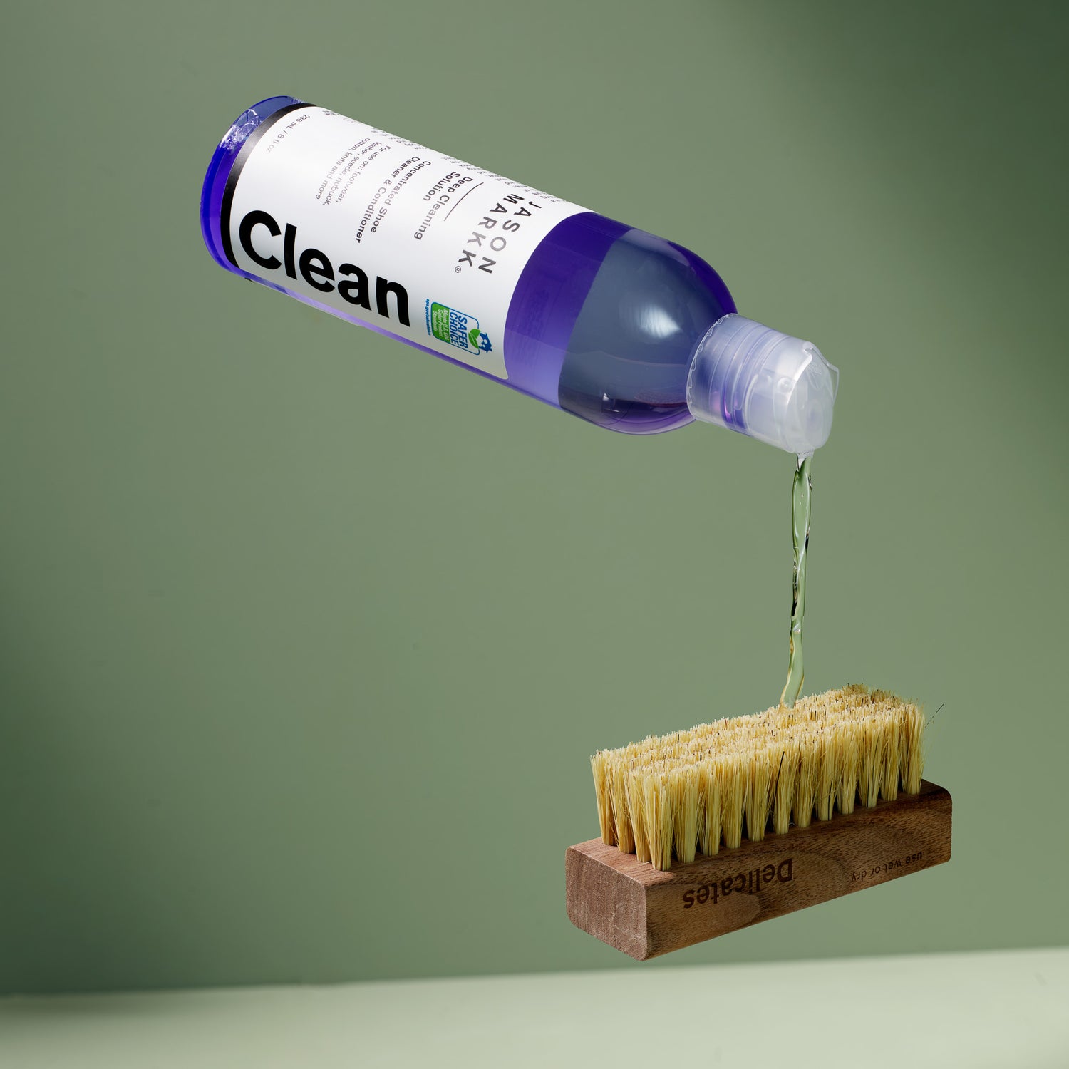 JASON MARKK DEEP CLEANING SOLUTION APPLIED ON A DELICATES CLEANING BRUSH