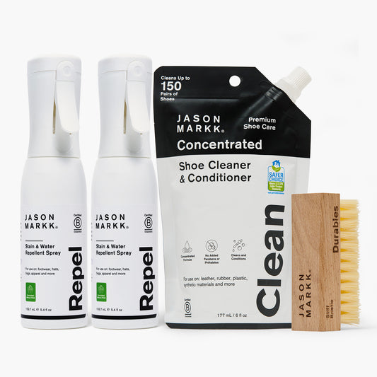 Jason Markk Deep Clean Bundle on white: two 5.4 fl oz (159.7 mL) Repel Stain & Water Repellent Spray bottles, formulated without PFAS, for footwear, hats, bags and apparel; a 6 fl oz (177 mL) Concentrated Shoe Cleaner & Conditioner pouch labeled Clean, EPA Safer Choice certified, cleans up to 150 pairs, no added parabens or phthalates, for leather, rubber, plastic and synthetic materials; and a wooden Durables stiff bristle brush. All Certified B Corporation.