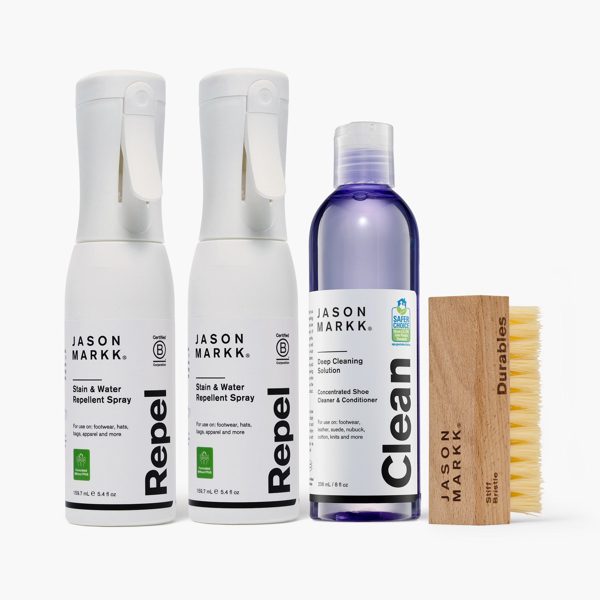 Four Jason Markk premium shoe care products displayed together on a white background: two 5.4 fl oz Repel Stain and Water Repellent Spray bottles (PFAS-free, Certified B Corporation) on the left, an 8 fl oz Deep Cleaning Solution concentrated shoe cleaner and conditioner in a purple bottle (EPA Safer Choice certified) in the center, and a Jason Markk Durables wooden stiff bristle shoe cleaning brush on the right.