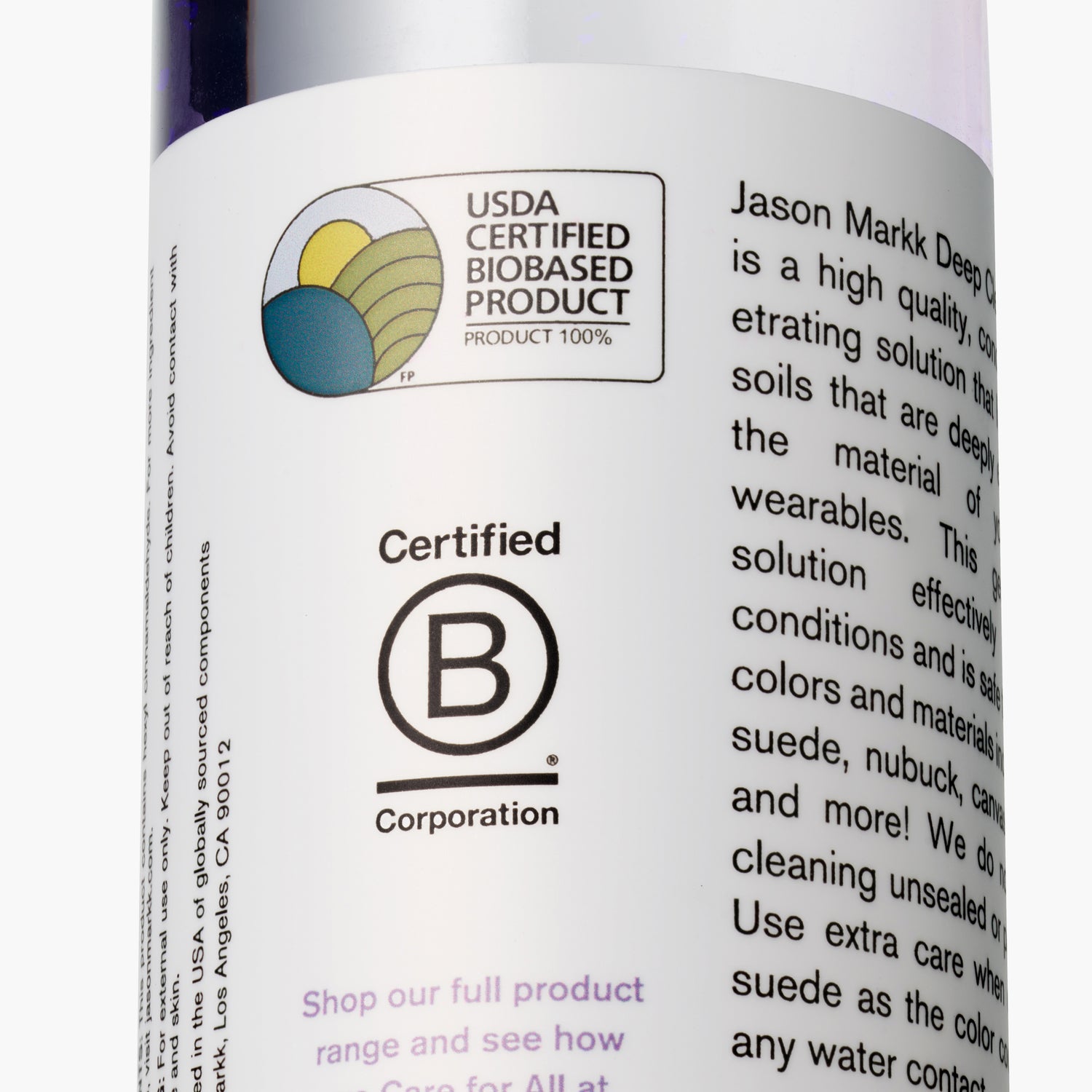 CLOSE UP OF JASON MARKK DEEP CLEANING SOLUTION LABEL SHOWING B CORP BADGES AND USDA BADGE