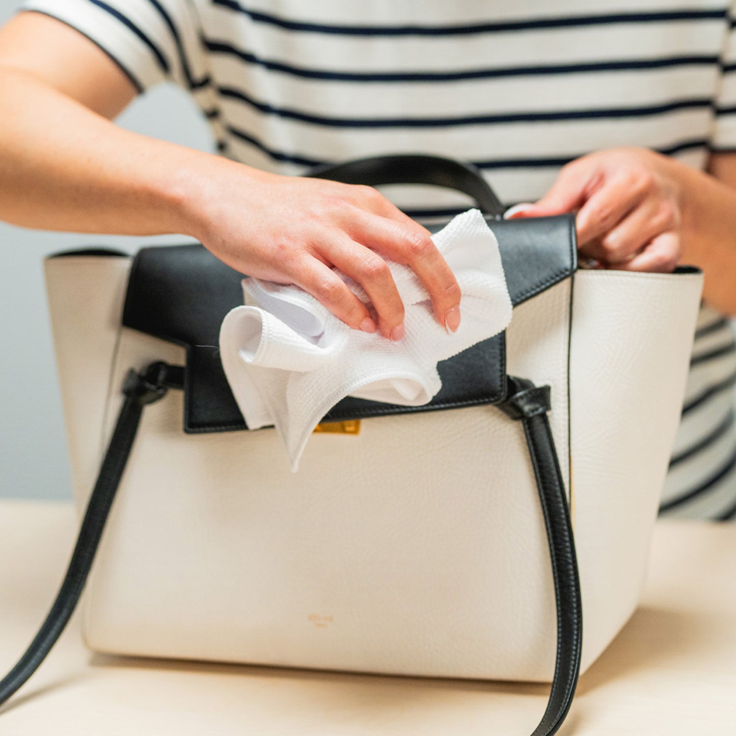 CLEANING A CELINE HANDBAG WITH A JASON MARKK MICROFIBER TOWEL 