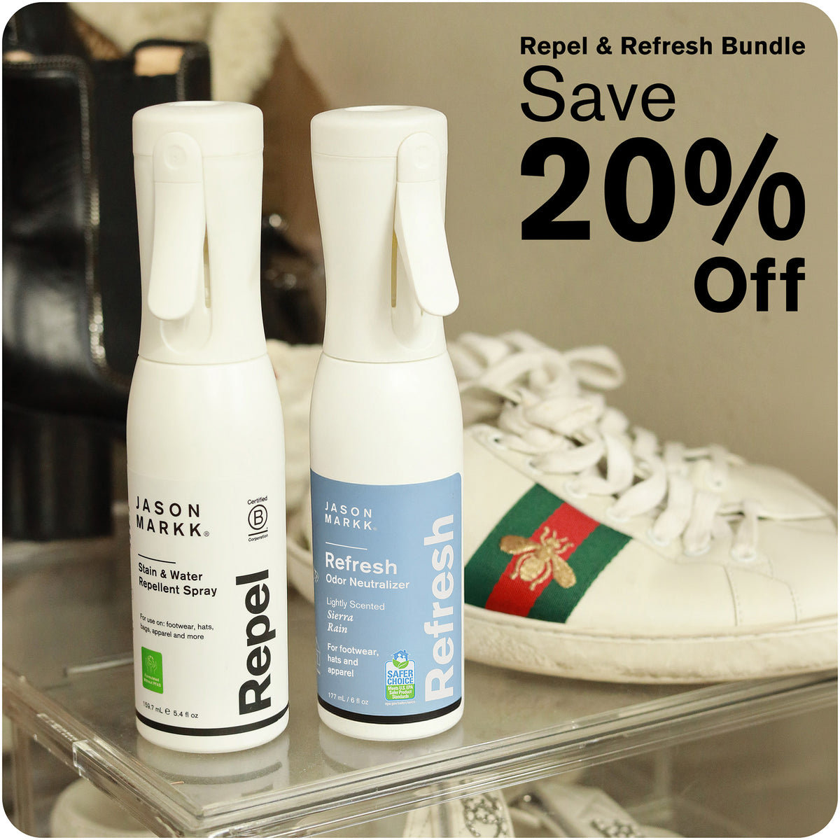 Jason Markk promo reading "Repel & Refresh Bundle — Save 20% Off." Two spray bottles on a glass table beside a white leather sneaker and a black boot. Left: Repel Stain & Water Repellent Spray, 159.7 mL / 5.4 fl oz, "for use on footwear, hats, bags, apparel and more," Certified B Corporation, Formulated Without PFAS. Right: Refresh Odor Neutralizer, Lightly Scented Sierra Rain, 177 mL / 6 fl oz, "for footwear, hats and apparel," EPA Safer Choice.