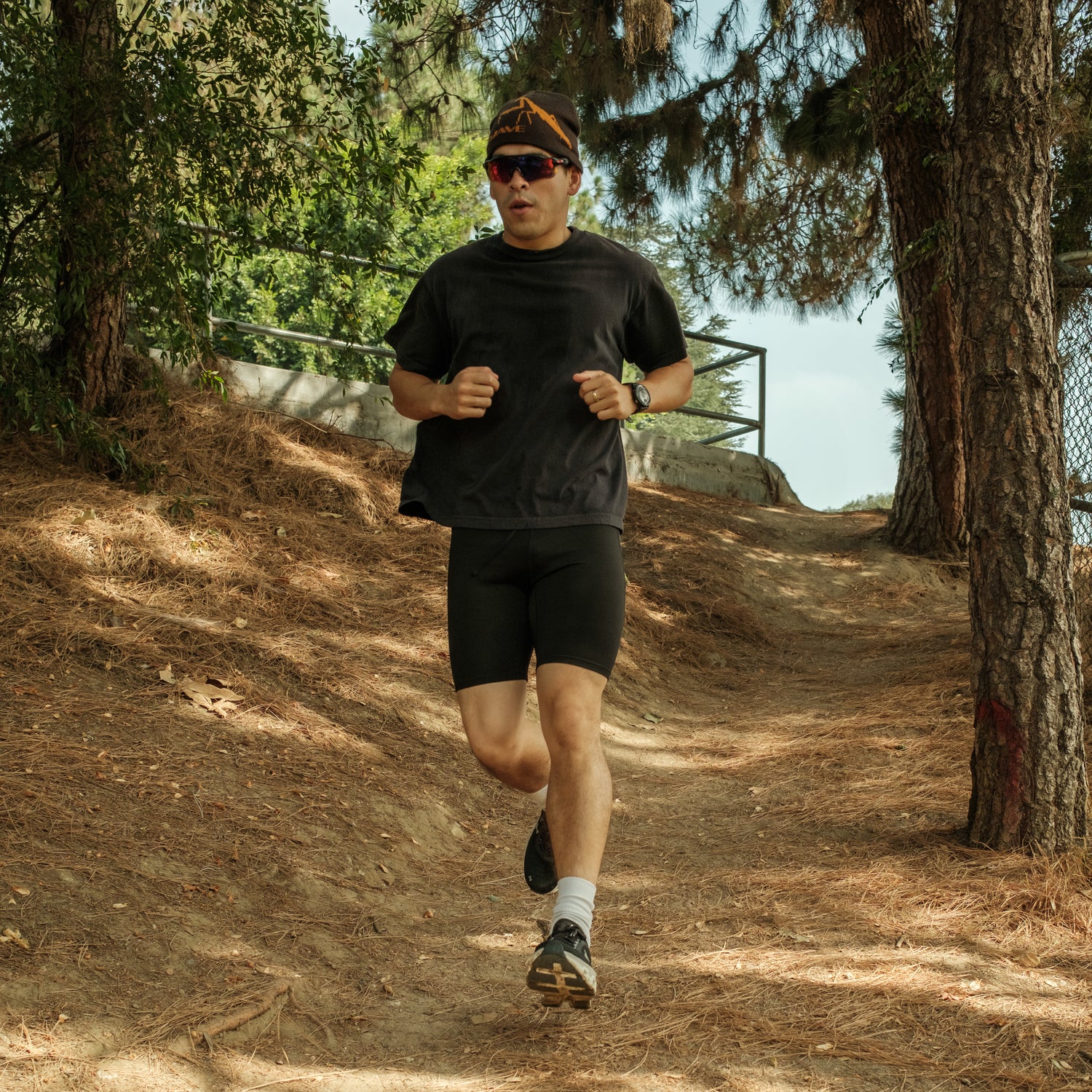 A MAN RUNNING IN THE PARK