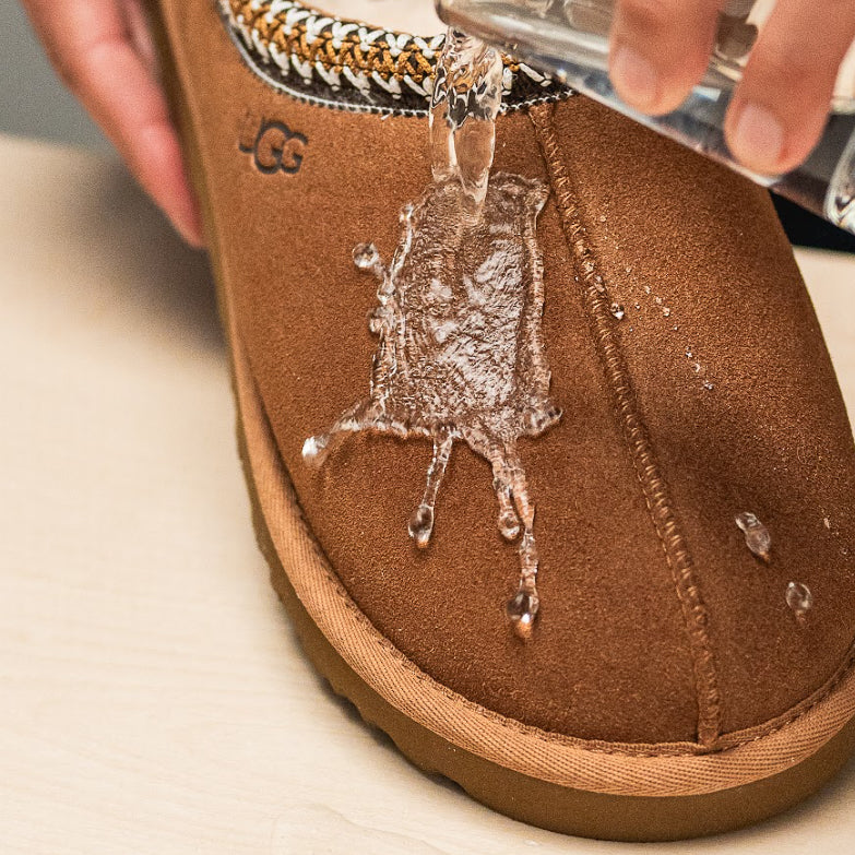 CLOSE OF UP UGG TAZMAN WITH WATER BEADING OFF OF SHOE AFTER JASON MARKK REPEL