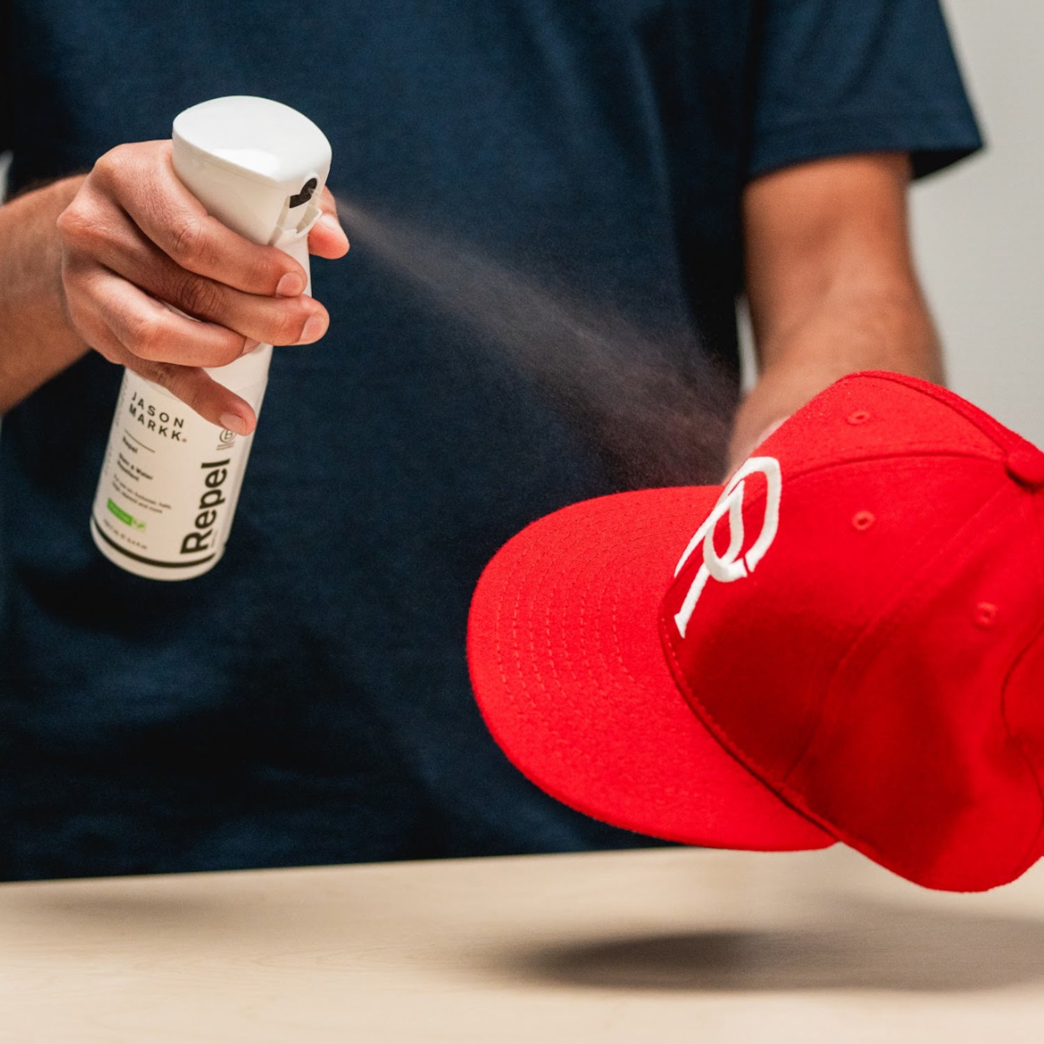 SPRAYING A RED HAT WITH JASON MARKK RPEL SPRAY 