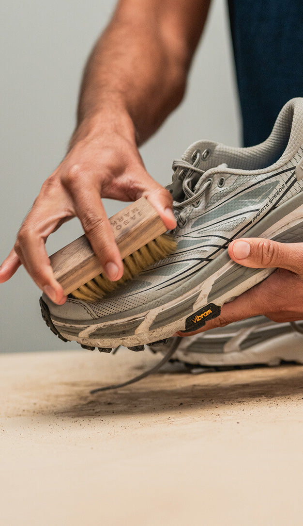 DRY BRUSHING TOP LAYER DIRT OFF OF A HOKA MAFATE SPEED 2 WITH A JASON MARKK DELICATES CLEANING BRUSH 