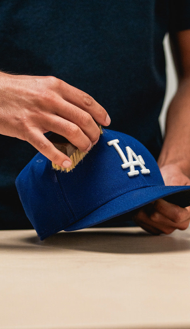 DRY BRUSHING A NEW ERA DODGER HAT WITH A JASON MARKK DELICATES CLEANING BRUSH