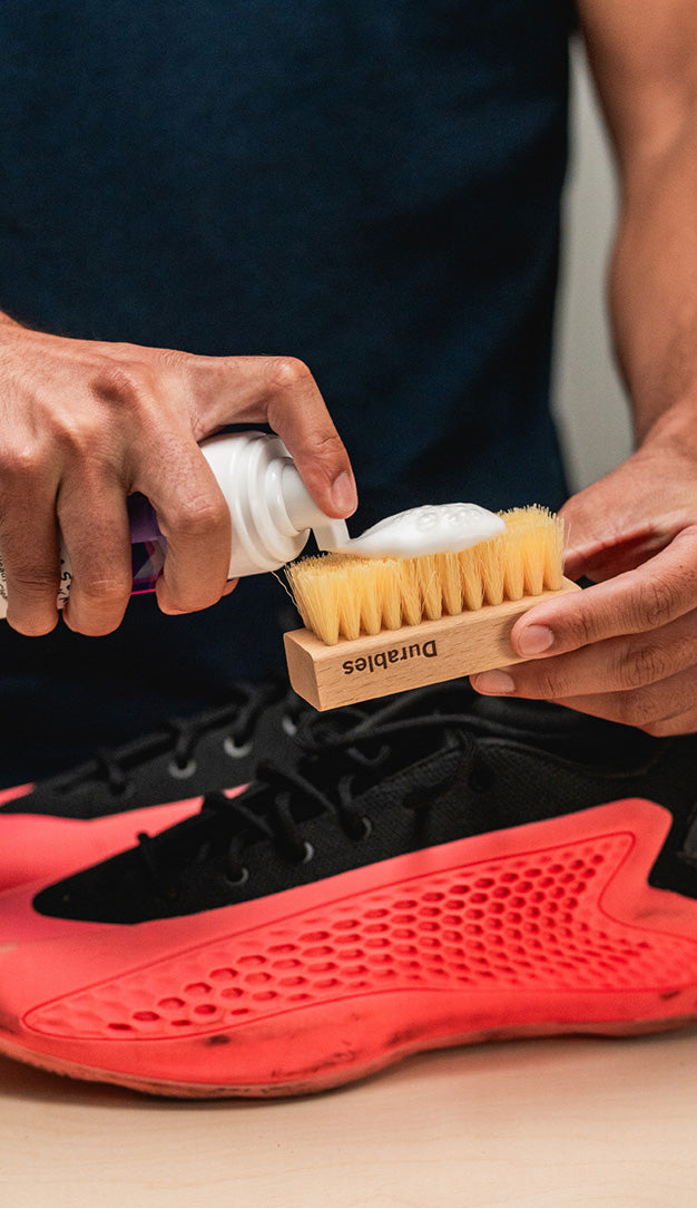 APPLYING JASON MARKK READY-TO-USE FOAM CLEANER ON A DURABLES BRUSH 