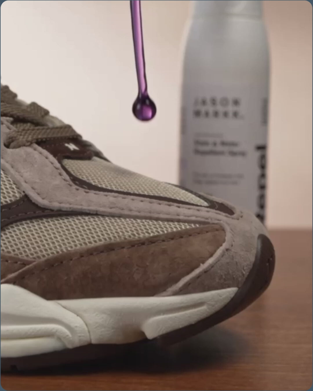 Jason Markk Repel Stain & Water Repellent Spray demo: purple liquid beads up and rolls off a treated suede and mesh sneaker. Scenes show protected shoes worn on grass, city sidewalks, in a store, at a stadium and at home, then hands spraying sneakers, loafers, clogs and running shoes with the white "Jason Markk Repel — Stain & Water Repellent Spray" bottle. Silent video with no on-screen text. Also Refresh Spray being used on multiple other shoes and worn throughout the week.